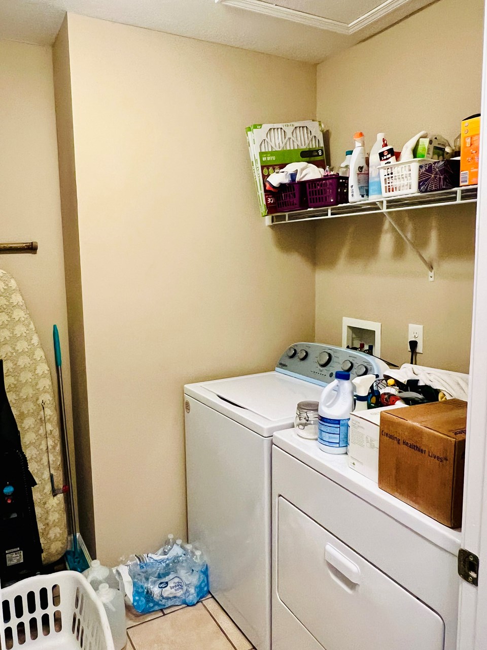 laundry room with tile floor