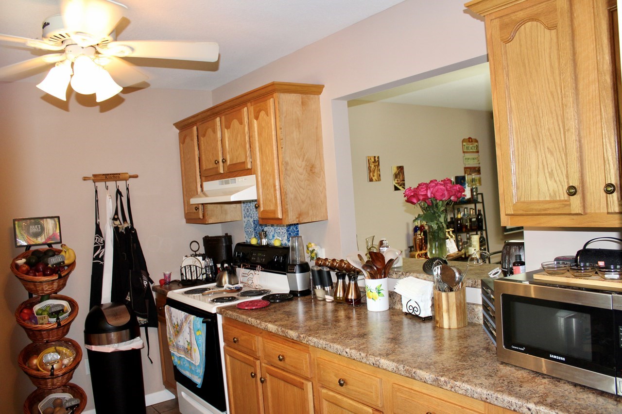 kitchen with pass-through to dining area