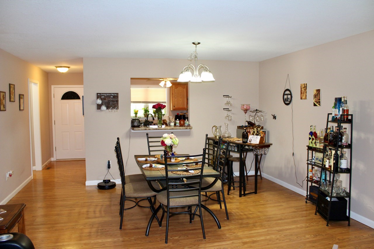 great room to dining area (note, photo taken in adjacent duplex building)